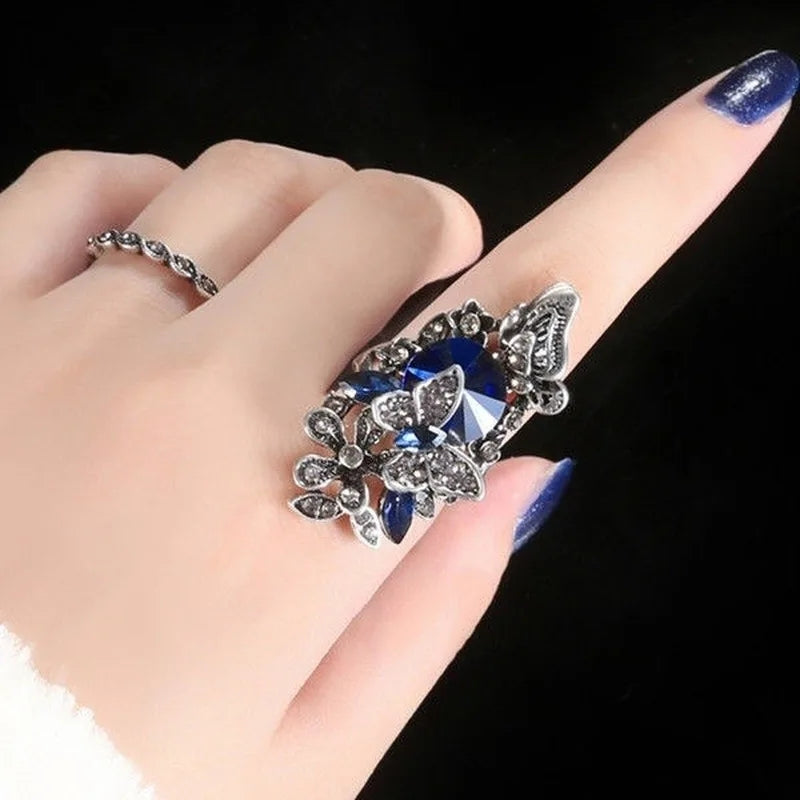 Anillos Doble de Mariposa y Gema Azul